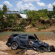 A vehicle destroyed by flooding sits in Trace Creek on Aug. 23, 2021 in Waverly, Tennessee